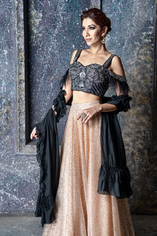 Black & dull silver embroidered cold shoulder blouse with feather detail & gold sequin skirt with feathers & ruffled dupatta Side Tie Blouse