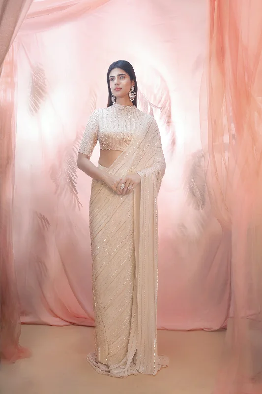 Golden Saree With An Elbow Sleeve Blouse Elegant Semi-Sheer Blouse