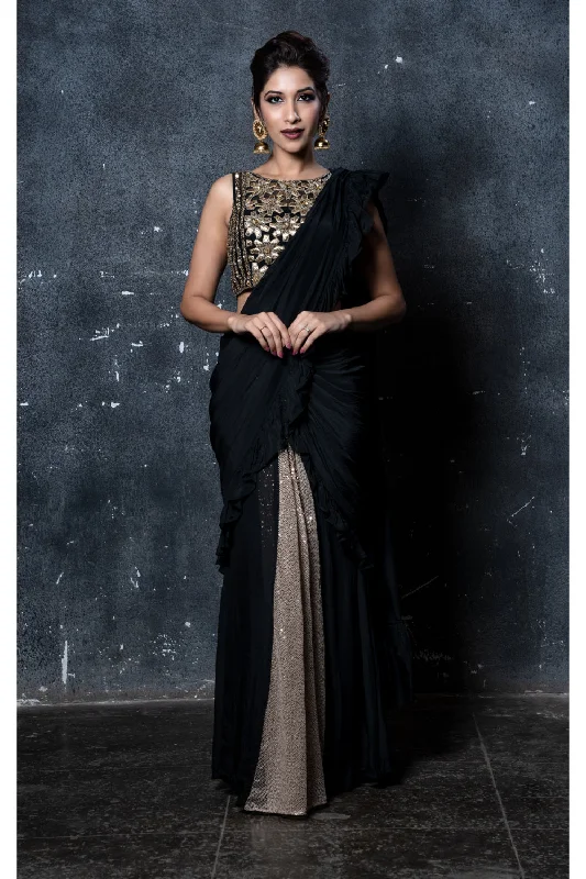 Black stitched ruffles saree with gold shimmer pleats & feathers with black & gold leather applique embroidered blouse Elegant Peplum Blouse