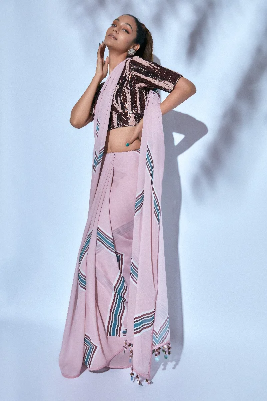 Printed Sari paired with Hand-embroidered Brown and Pink Blouse Textured Cotton Blouse